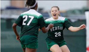 Reagan’s Taylor Olson (28) reacts after scoring an early goal against Johnson in girls soccer at Blossom Soccer Stadium on Feb. 5, 2016. Johnson defeated Reagan, 2-1.